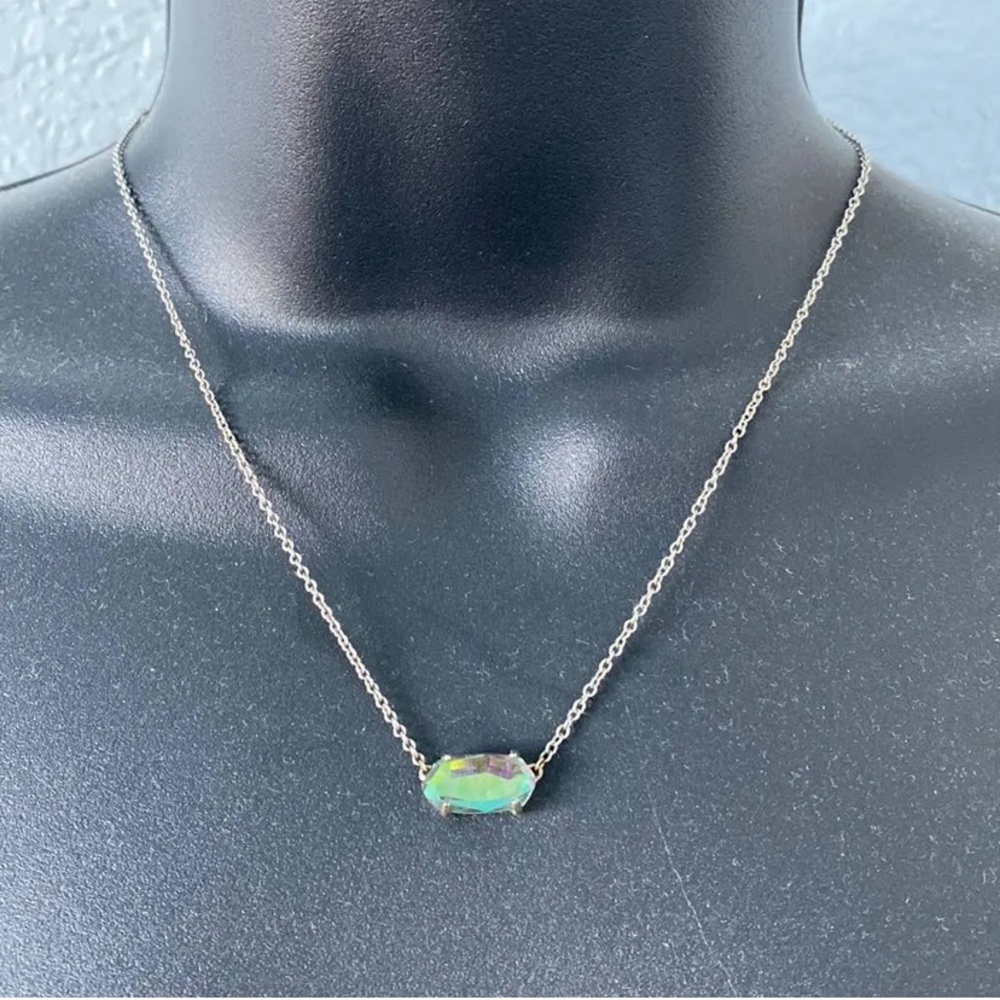 Kendra Scott necklace with silver chain and blue/green pendant